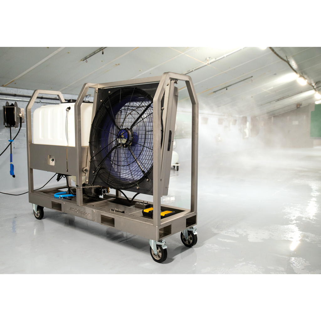 Fine mist disinfection machine operating in livestock building